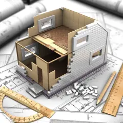 Model domu w przekroju na planach architektonicznych, narzędzia budowlane i małe cegiełki. Wizualizacja projektu budowlanego, który może być początkiem samowoli budowlanej.